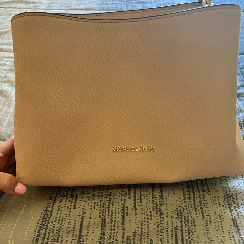 Michael Kors rose gold purse with matching wallet